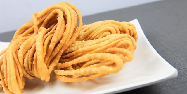 炸馓子的简单做法,又酥又脆的客家炸馓子图11